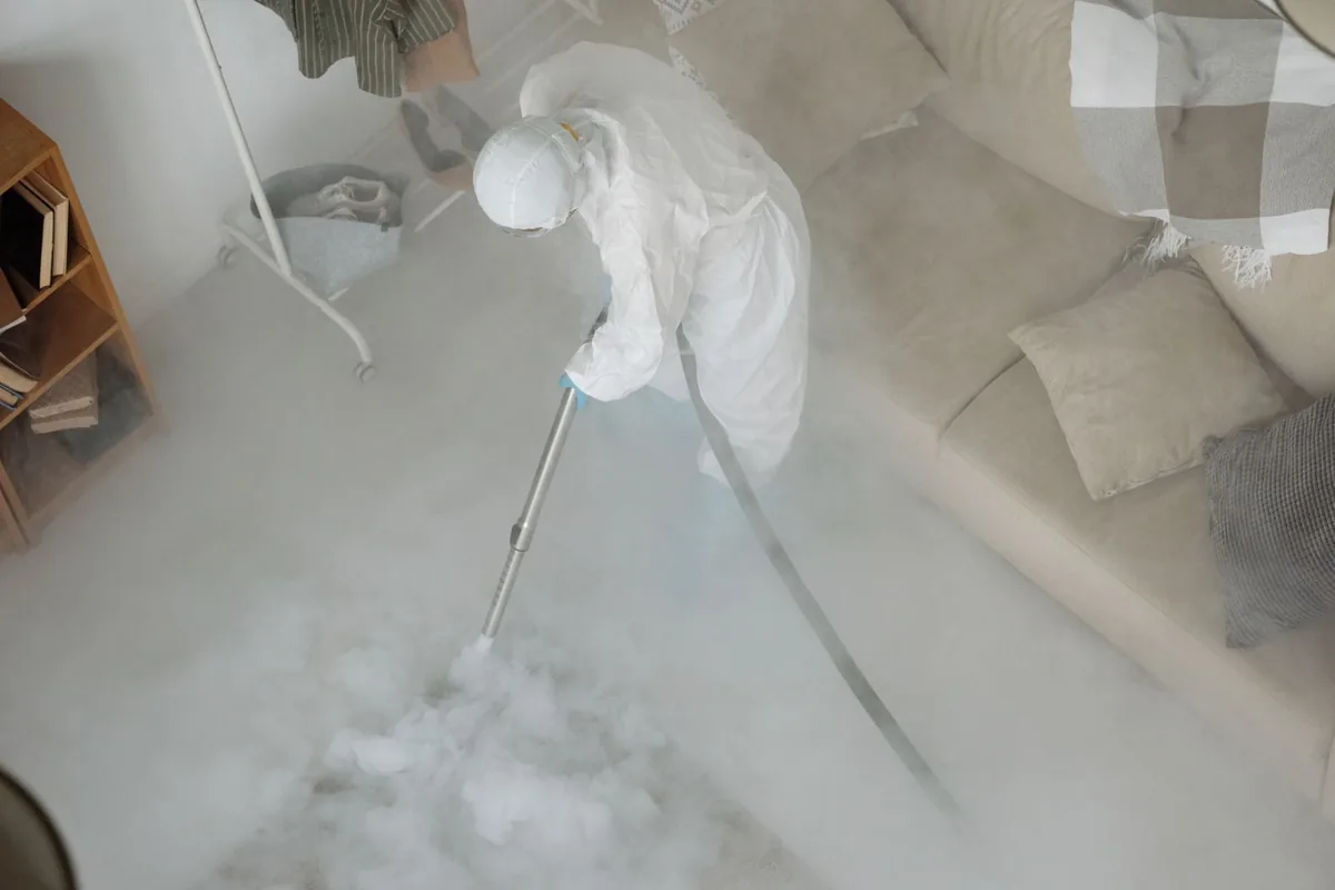 Biohazard cleanup technician in protective equipment, Le Claire, IA